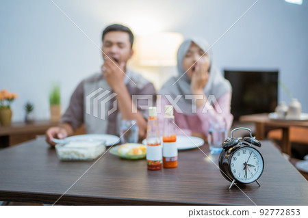 muslim couple having breakfast or sahur in morning muslim couple having breakfast or sahur in morning 92772853