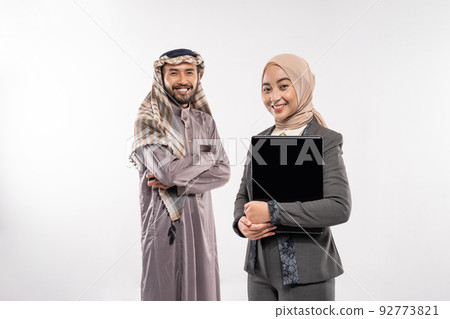 muslim business partner portrait looking at camera smiling 92773821