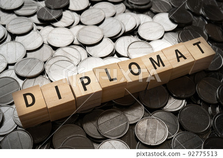 Diplomat image | Blocks and coins written "DIPLOMAT" Diplomat image | Blocks and coins written "DIPLOMAT" 92775513