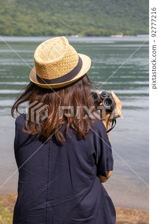 A woman traveling in Onuma on Mt. Akagi A woman traveling in Onuma on Mt. Akagi 92777216