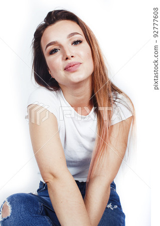 young pretty stylish blond girl posing emotional isolated on white background happy smiling cool smile, lifestyle people concept close up young pretty stylish blond girl posing emotional isolated on white background happy smiling cool smile, lifestyle people concept close up 92777608