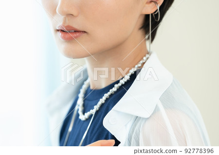 A woman wearing a shirt A woman wearing a shirt 92778396