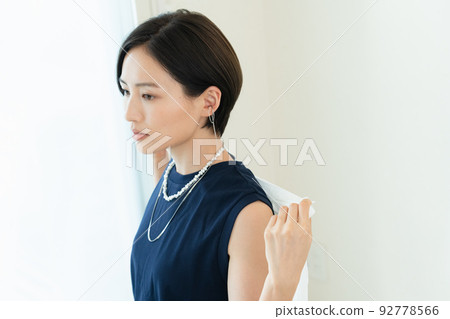 A woman wearing a shirt A woman wearing a shirt 92778566