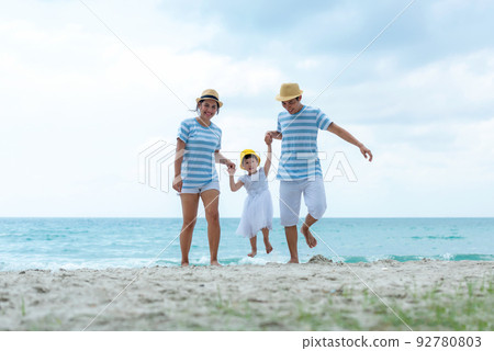 Happy family summer sea beach vacation. Asia young people lifestyle travel enjoy fun 92780803