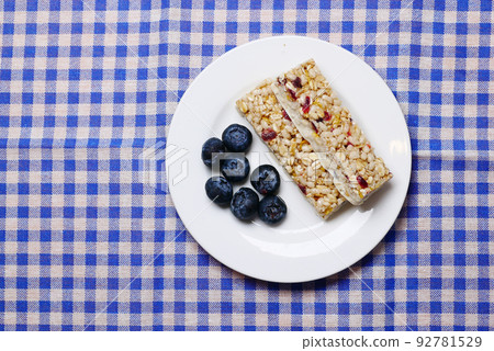 blue berry oat protein bars on table blue berry oat protein bars on table 92781529