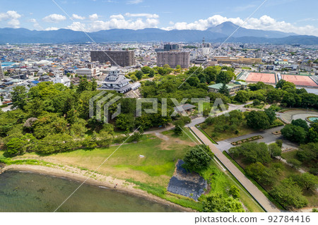 Nagahama Castle built on the shores of Lake Biwa, Nagahama City, and Mt. 92784416