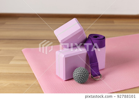 Yoga blocks, exercise mat and yoga belt for training. Yoga equipment. Yoga blocks, exercise mat and yoga belt for training. Yoga equipment. 92788101