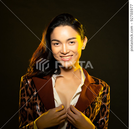 Half body portrait of Asian beautiful woman wear formal blazer, unisex handsome man look make up 92788977