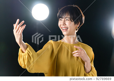 Female actress theater stage singing Female actress theater stage singing 92789669