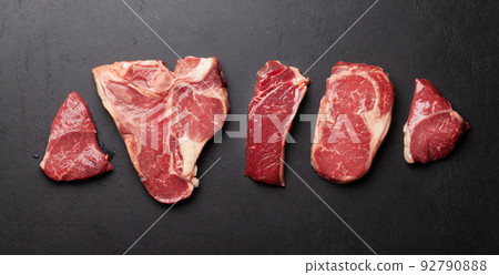 Various raw beef steaks 92790888