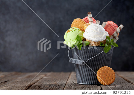 Various ice cream in waffle cones Various ice cream in waffle cones 92791235
