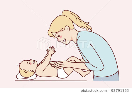 Happy mom playing with newborn Happy mom playing with newborn 92791563