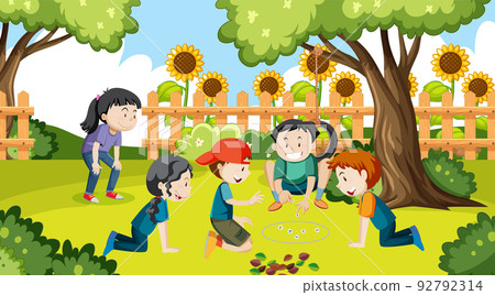 Children playing jack stones at the park Children playing jack stones at the park 92792314