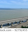 The sea and the road seen from the top of the mountain 92792455