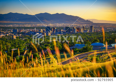 Salt Lake City skyline at sunset with Wasatch Mountains in the background, Utah 92793905