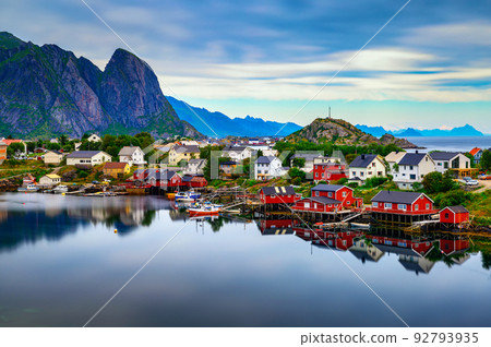 Reine village with red rorbu cottages and mountains on Lofoten islands, Norway 92793935