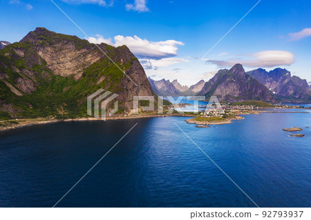 Reine fishing village surrounded by high mountains and fjords on Lofoten islands 92793937