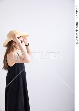 A woman dressed like summer Summer 92795362