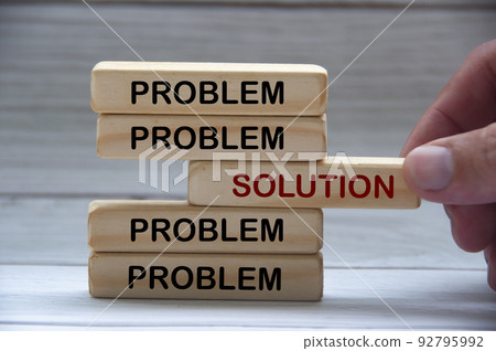 Problem and solution text on wooden blocks. Solution concept 92795992