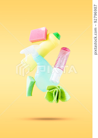 Cleaning concept - velitation of cleaning supplies on pastel background Cleaning concept - velitation of cleaning supplies on pastel background 92796987