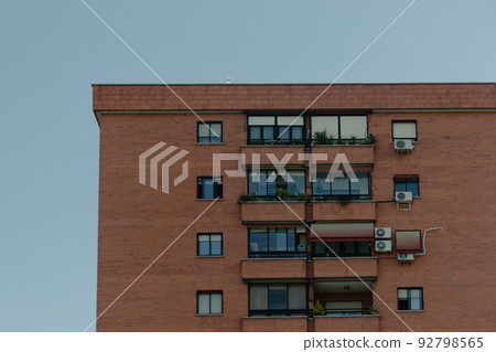 orange and white old house in madrid with strong lights and shadows orange and white old house in madrid with strong lights and shadows 92798565
