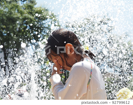 Playing in the water 92799612