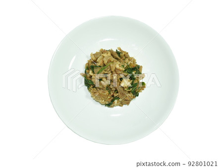 spicy stir fried chop beef with chili and basil leaf on plate  92801021