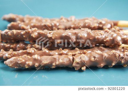 almond nut dark chocolate stick on table almond nut dark chocolate stick on table 92801220