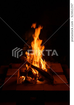 Bonfire in refractory brick fire pit Bonfire in refractory brick fire pit 92802297