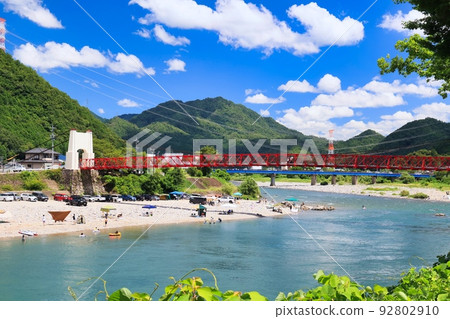 Red Mino Bridge over the Nagara River in Mino City, Gifu Prefecture Red Mino Bridge over the Nagara River in Mino City, Gifu Prefecture 92802910