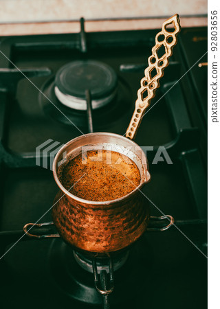 Brewing Coffee in Traditional Pot 92803656