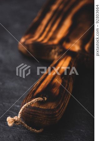 Handmade Cutting Board on Dark Background Handmade Cutting Board on Dark Background 92803664