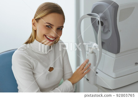 Ophthalmology Clinic. Woman Preparing Checking Eye Vision Ophthalmology Clinic. Woman Preparing Checking Eye Vision 92803765