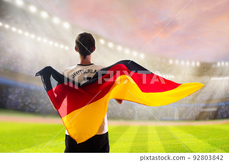Germany football team supporter on stadium. 92803842