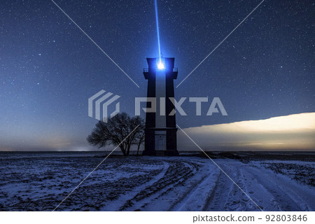 Bright lighthouse beaconing at the end of the milky way. Beautiful lighthouse. Bright lighthouse beaconing at the end of the milky way. Beautiful lighthouse. 92803846
