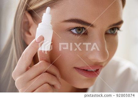Vision And Ophthalmology Medicine. Beautiful Woman Applying Eyedrops 92803874