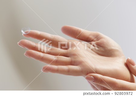 Contact Eye Lenses. Woman Hands Holding Contact Eye Lens Contact Eye Lenses. Woman Hands Holding Contact Eye Lens 92803972
