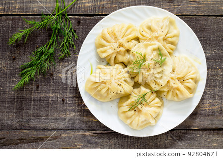 Traditional Georgian khinkali, selective focus, top view. 92804671