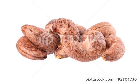 Cashew nuts in shell isolated on white background. Roasted and salted cashew nuts. Clipping path. Cashew nuts in shell isolated on white background. Roasted and salted cashew nuts. Clipping path. 92804730