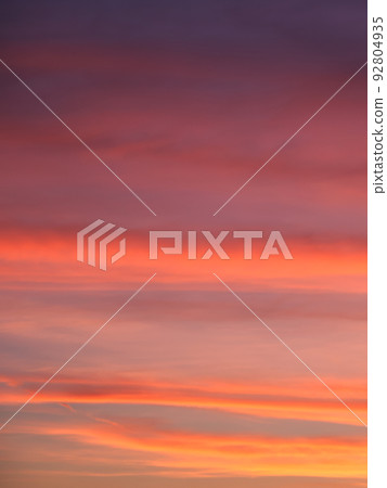 Vibrant and Colorful Sunset background. Bright sunset sky, full frame. The sky as a background. Vibrant and Colorful Sunset background. Bright sunset sky, full frame. The sky as a background. 92804935