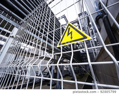 The sign in the yellow triangle is Danger 92805799