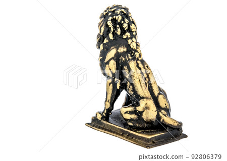 Lion Vintage Antique grunge bronze brass figurine statue of beautiful animal, isolated on white background. Decoration Sculpture for interior. Copy Space for Text. Close up Selective soft focus. Lion Vintage Antique grunge bronze brass figurine statue of beautiful animal, isolated on white background. Decoration Sculpture for interior. Copy Space for Text. Close up Selective soft focus. 92806379
