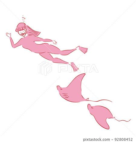 Female diver swimming with manta rays 92808452