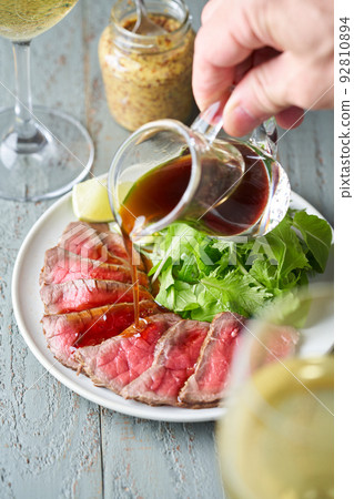 Roast beef served on a plate Roast beef served on a plate 92810894
