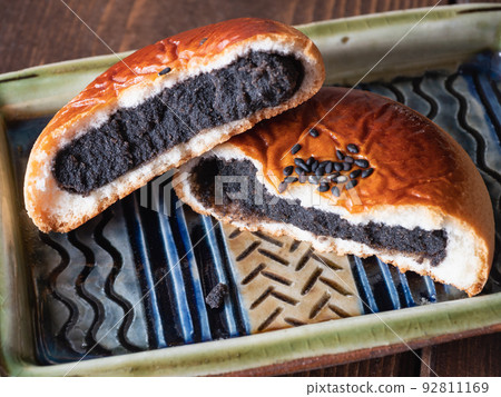 Cross section of Tsukisamu Anpan, one of Hokkaido's famous sweets. Manju with red bean paste inside. 92811169