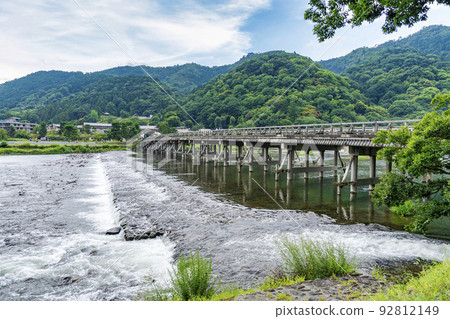 Arashiyama, Kyoto in summer, Katsura River and Togetsukyo Bridge at dusk, Kyoto City, Kyoto Prefecture Arashiyama, Kyoto in summer, Katsura River and Togetsukyo Bridge at dusk, Kyoto City, Kyoto Prefecture 92812149