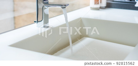 Water flowing into modern sink basin, tap water, Antiseptic, personal Hygiene and Healthcare concept Water flowing into modern sink basin, tap water, Antiseptic, personal Hygiene and Healthcare concept 92815562