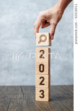 2023 block with magnifying glass icon. SEO, Search Engine Optimization, hiring , Advertising, Idea, Strategy, marketing, Keyword, Content and New Year start concepts 2023 block with magnifying glass icon. SEO, Search Engine Optimization, hiring , Advertising, Idea, Strategy, marketing, Keyword, Content and New Year start concepts 92816011