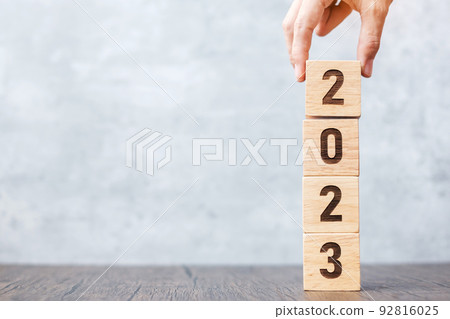 2023 year block on table. goal, Resolution, strategy, plan,, start, budget, mission, action, motivation and New Year holiday concepts 92816025