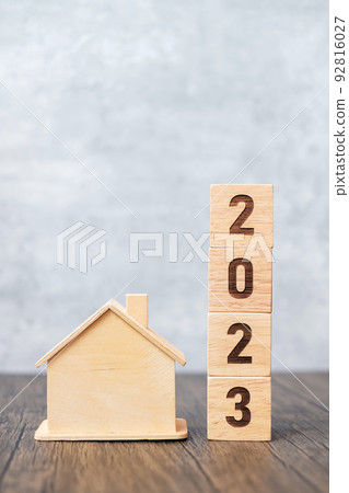 2023 block with house model. real estate, Home loan, tax, investment, financial, savings and New Year Resolution concepts 92816027